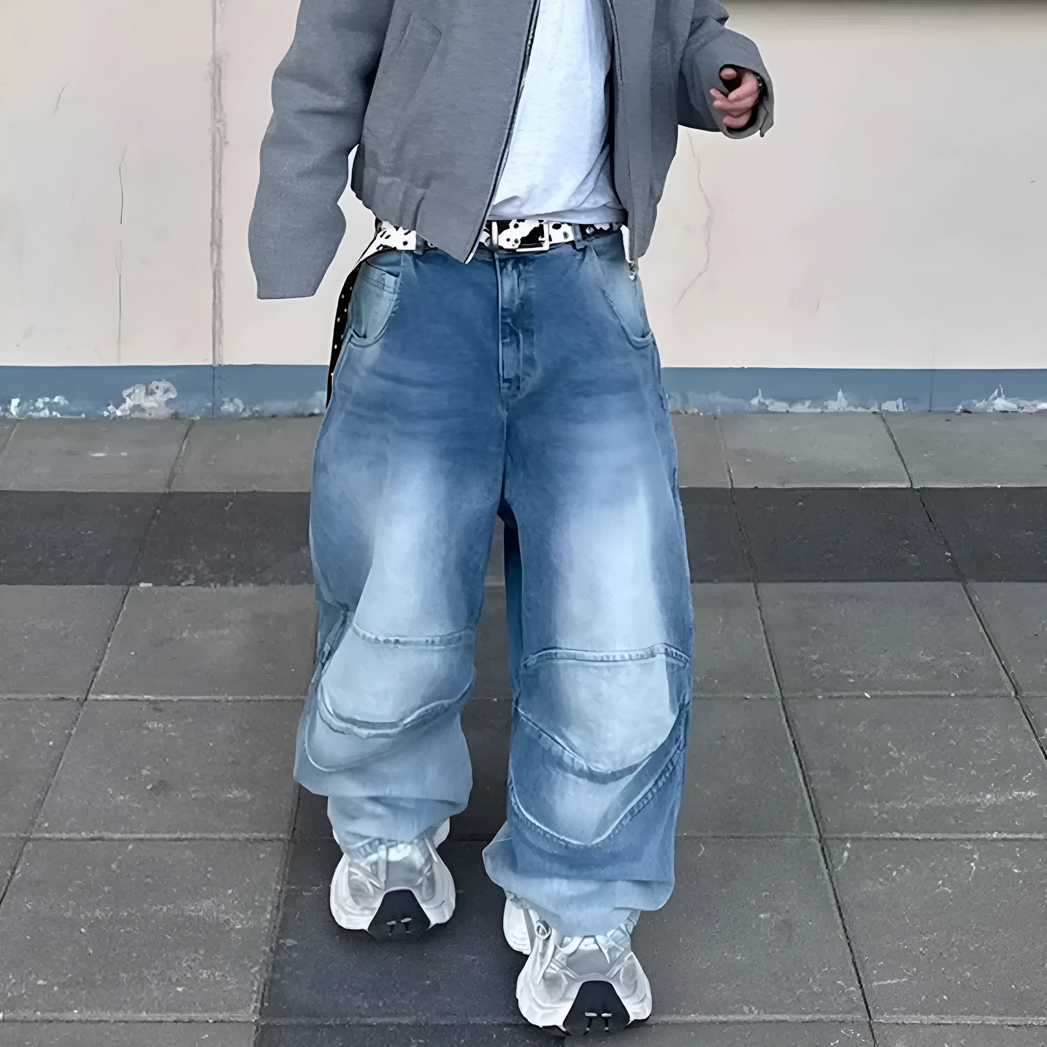 Baggy washed blue straight-leg jeans with zip fly on mannequin