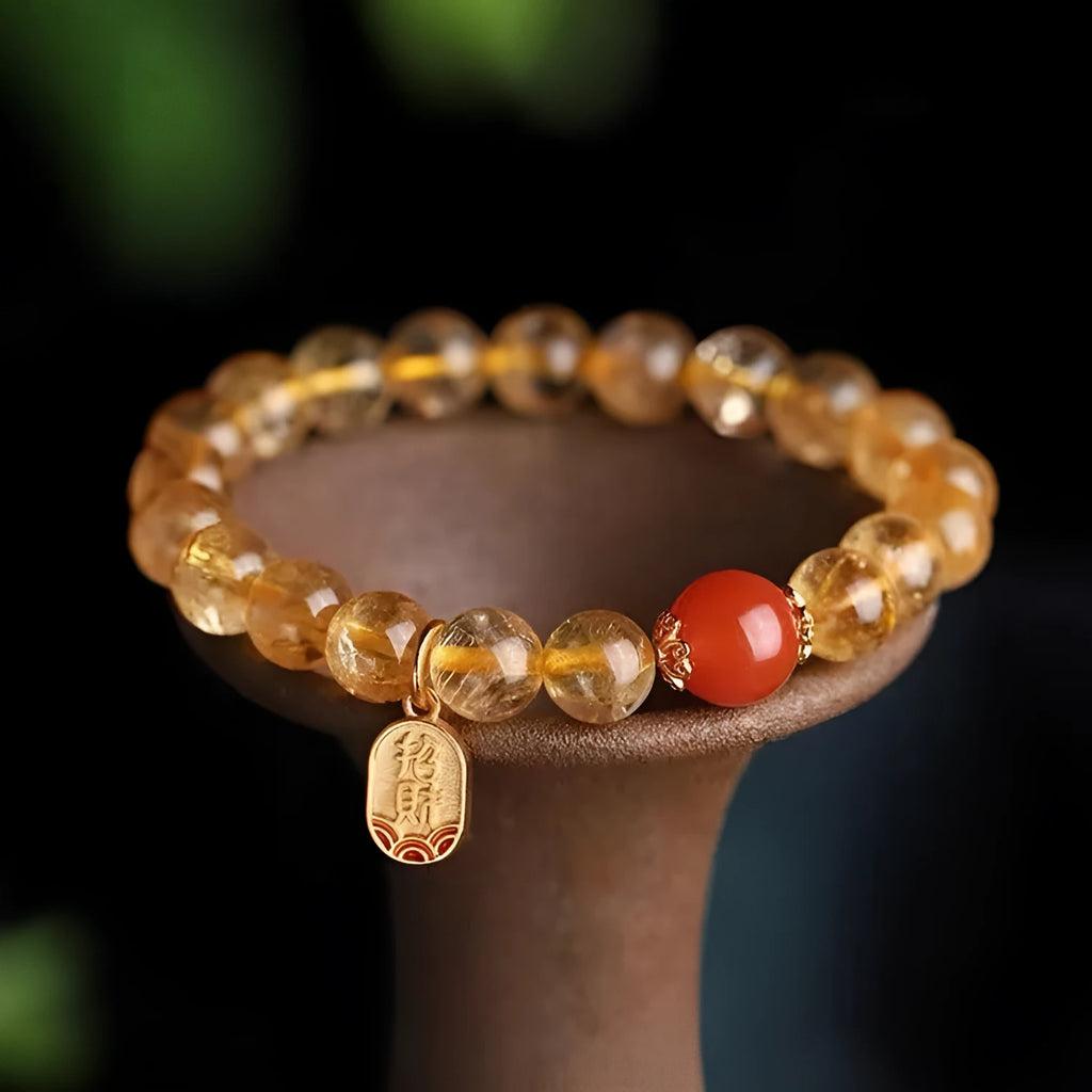 Natural red agate bead bracelet with a gold-plated clasp, showing 6mm, 8mm, and 10mm size options.