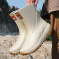 Men's mid-cut waterproof rain boots in four colours with non-slip plastic soles
