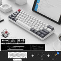 RK 61 black wireless mechanical keyboard with 60% compact layout and carrying belt on a desk