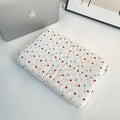Women's polka dot laptop bag in breathable polyester with size options for computer protection