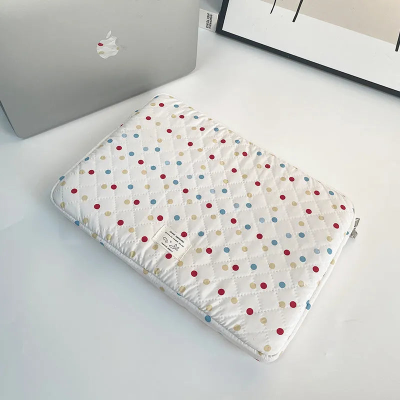 Women's polka dot laptop bag in breathable polyester with size options for computer protection