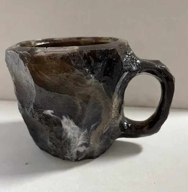Purple resin mineral crystal coffee mug with handle showing 3D texture and 10cm height