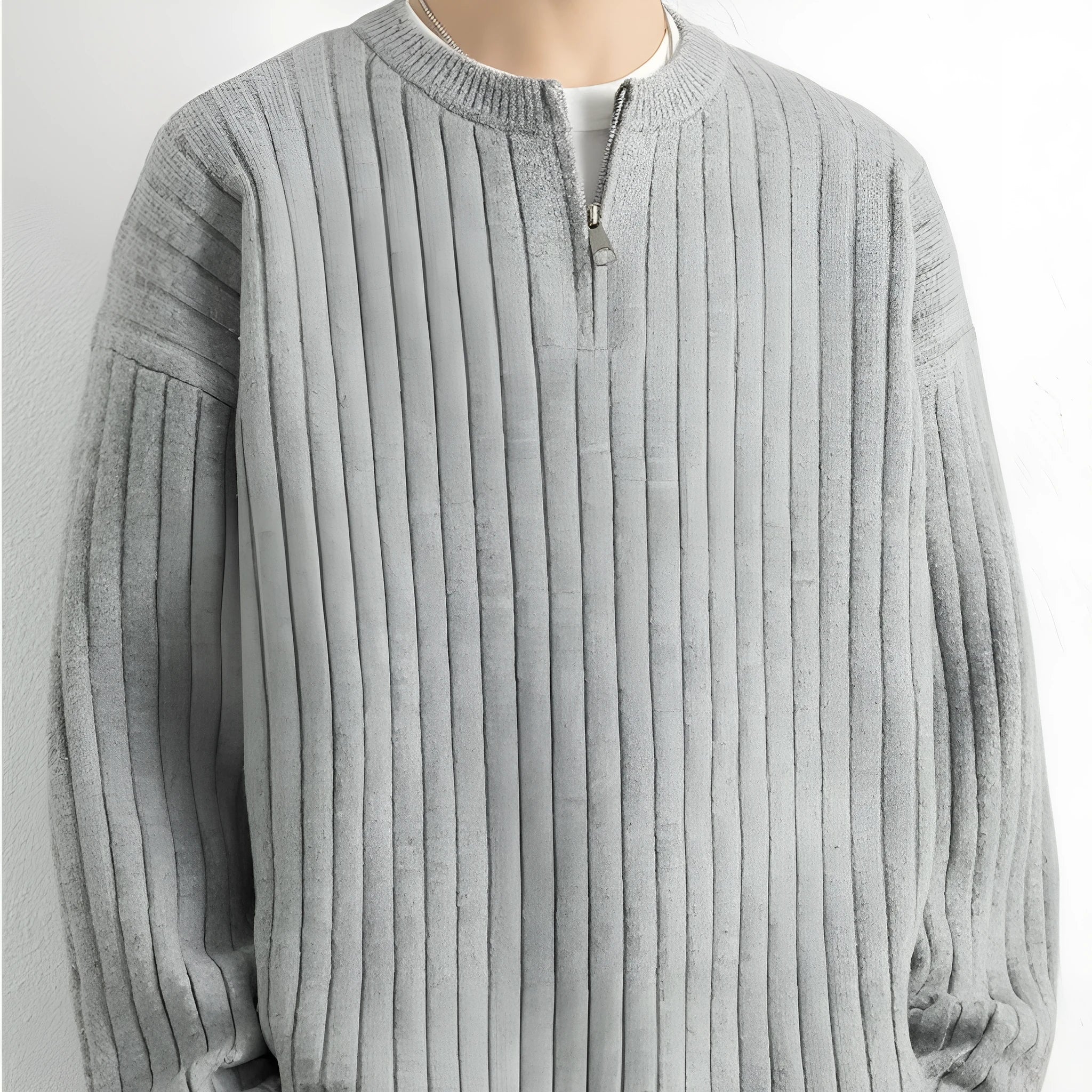 Men's grey half zip sweater with textured knit pattern and loose fit long sleeve design