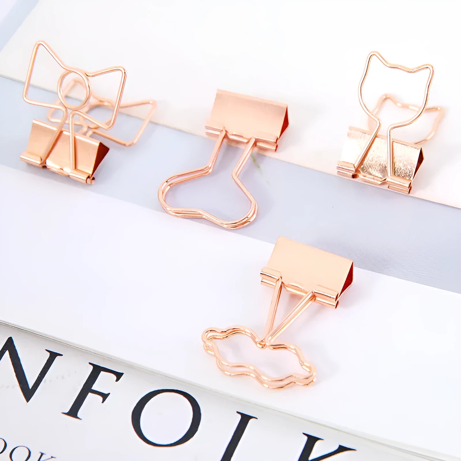 Gold-coloured metal alligator hair clip in a choice of flamingo, love, cloud, cat, cactus, or bow shapes.