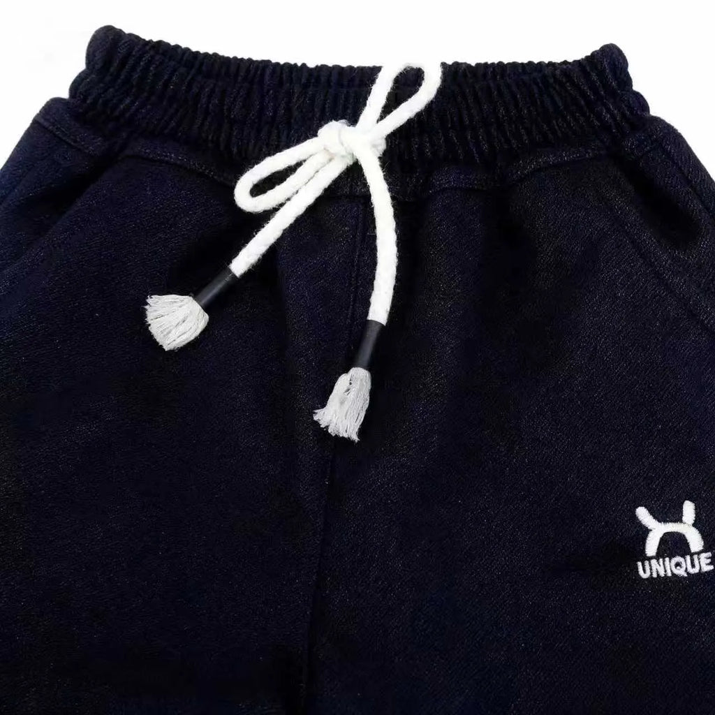 Children's trousers in black and blue with drawstring waist and ribbed hem, sizes 22-26 for ages 3-7