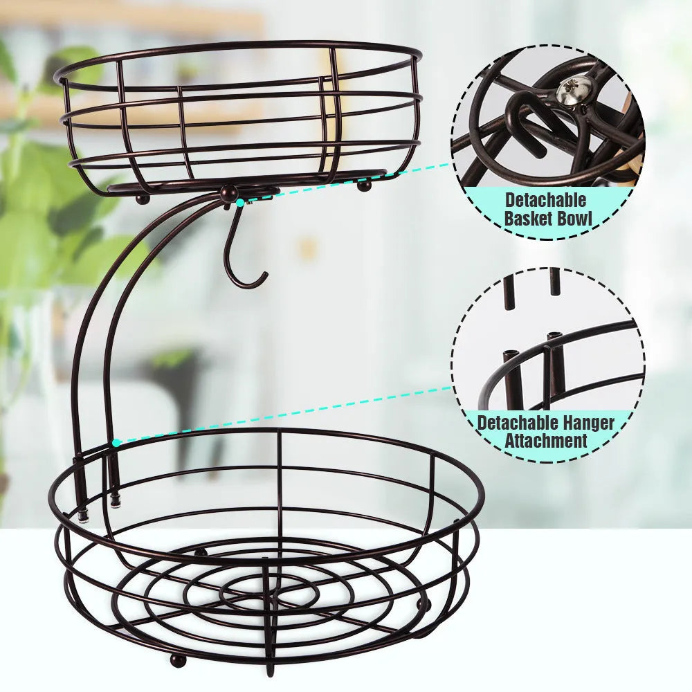 Black and gold two-tier wrought iron fruit storage basket with open metal framework.