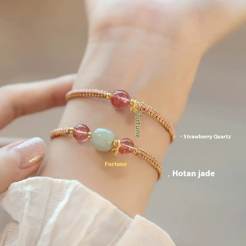 Adjustable red rope bracelet with strawberry quartz transfer beads and sliding knot closure