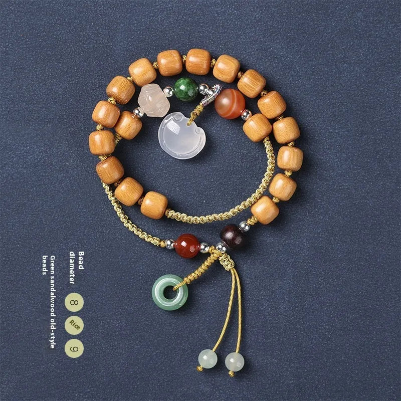 Hand-woven ebony double ring bracelet with ruyi elements in jade or chalcedony colour options