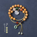Hand-woven ebony double ring bracelet with ruyi elements in jade or chalcedony colour options