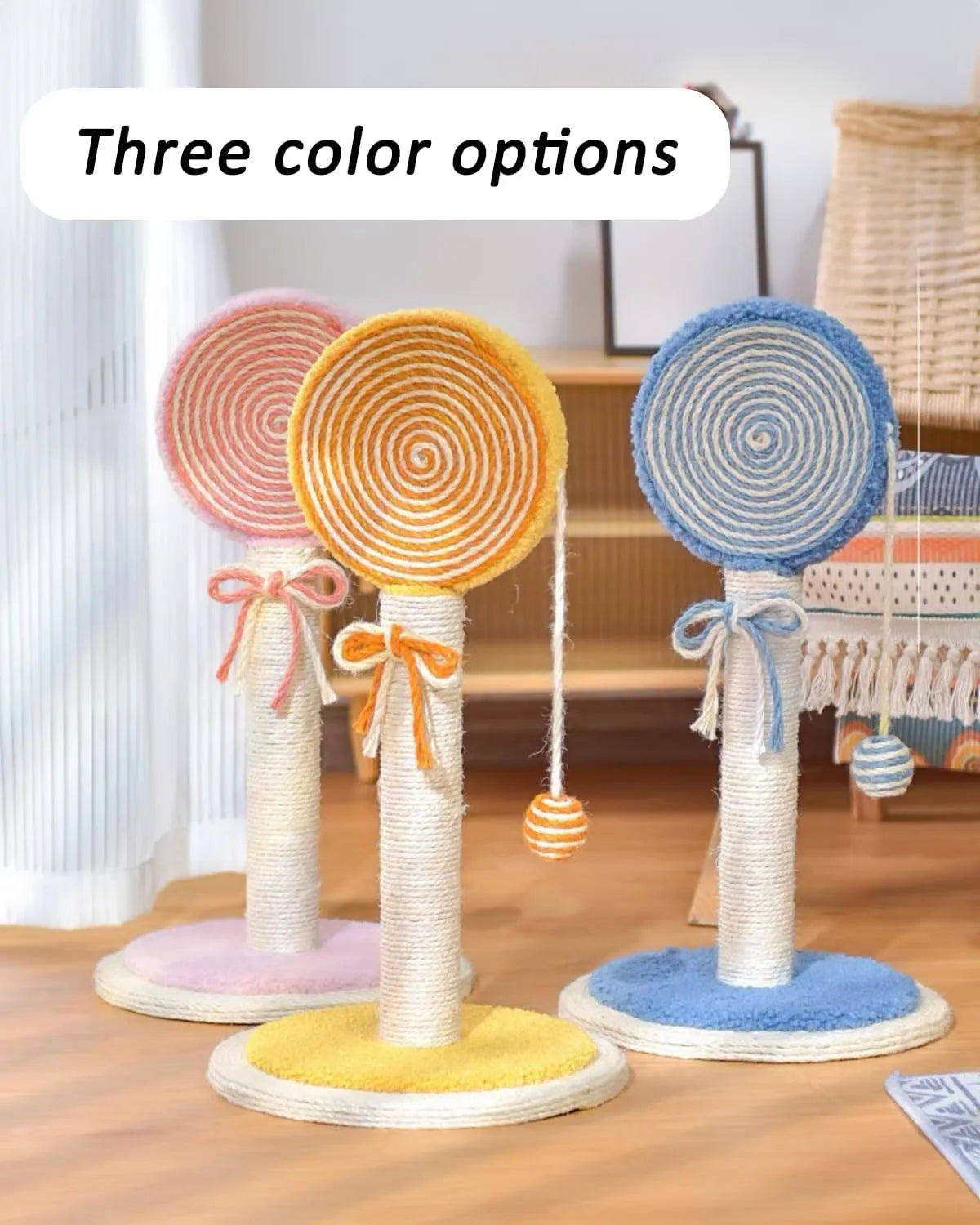 Blue cat scratching post with sisal rope and a hanging yellow ball toy on a sturdy wooden base.