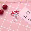 Colourful metal hair barrette for children with a printed strawberry design.