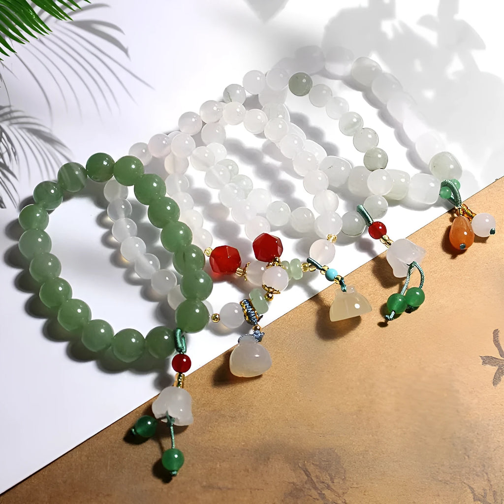 Hand-woven Chinese style agate bracelet with lotus seedpod beads and geometric design