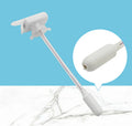 Manual beverage pump with long silicone straw and blue press handle on a bottle