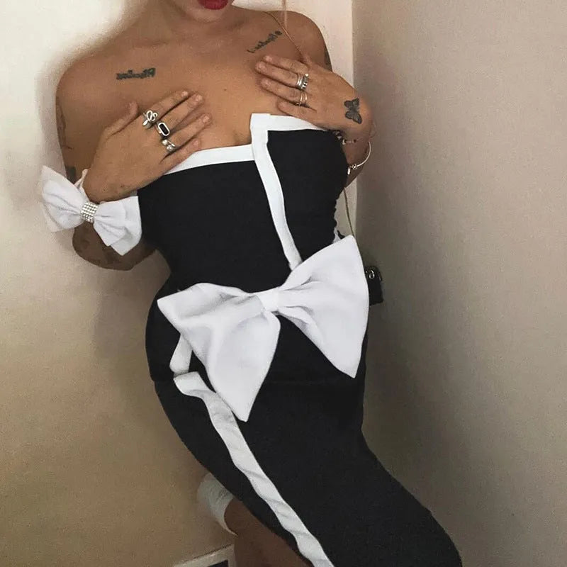 Women's black and white colour-block one-piece swimsuit with bow detail and tube top