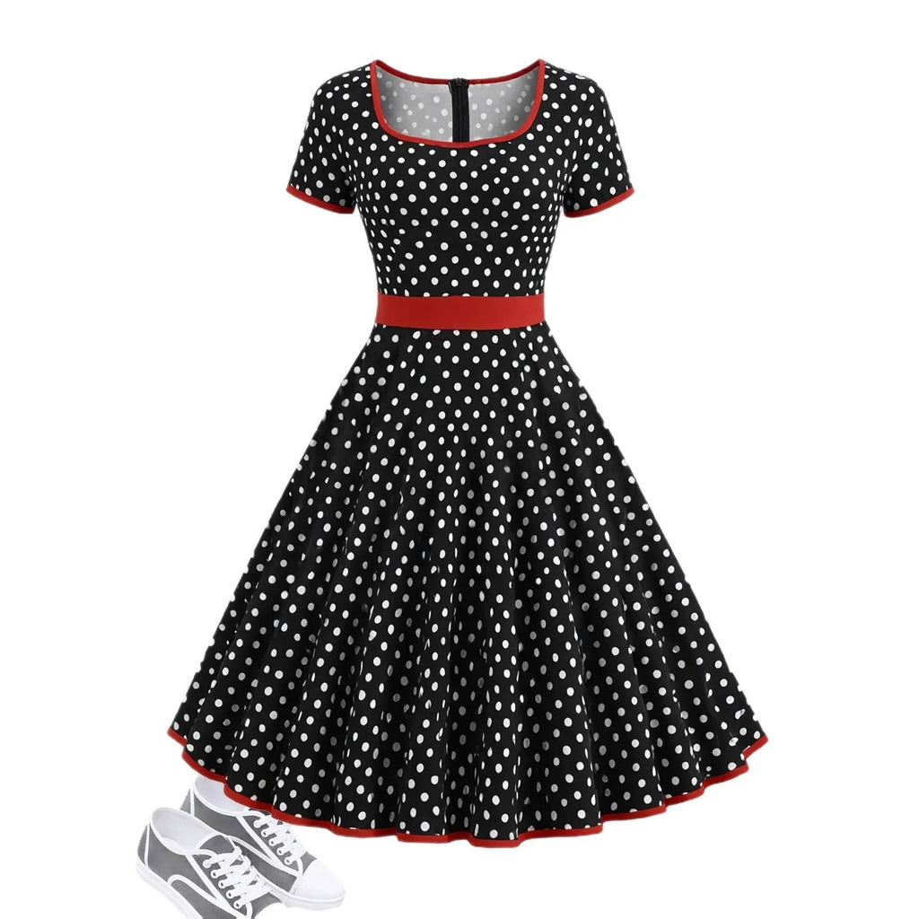 Women's multicolour polka dot pleated dress with a square collar, short sleeves, and a front zip fastener.