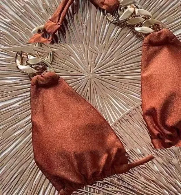 Brown women's tube top push-up split bikini swimsuit on a mannequin.