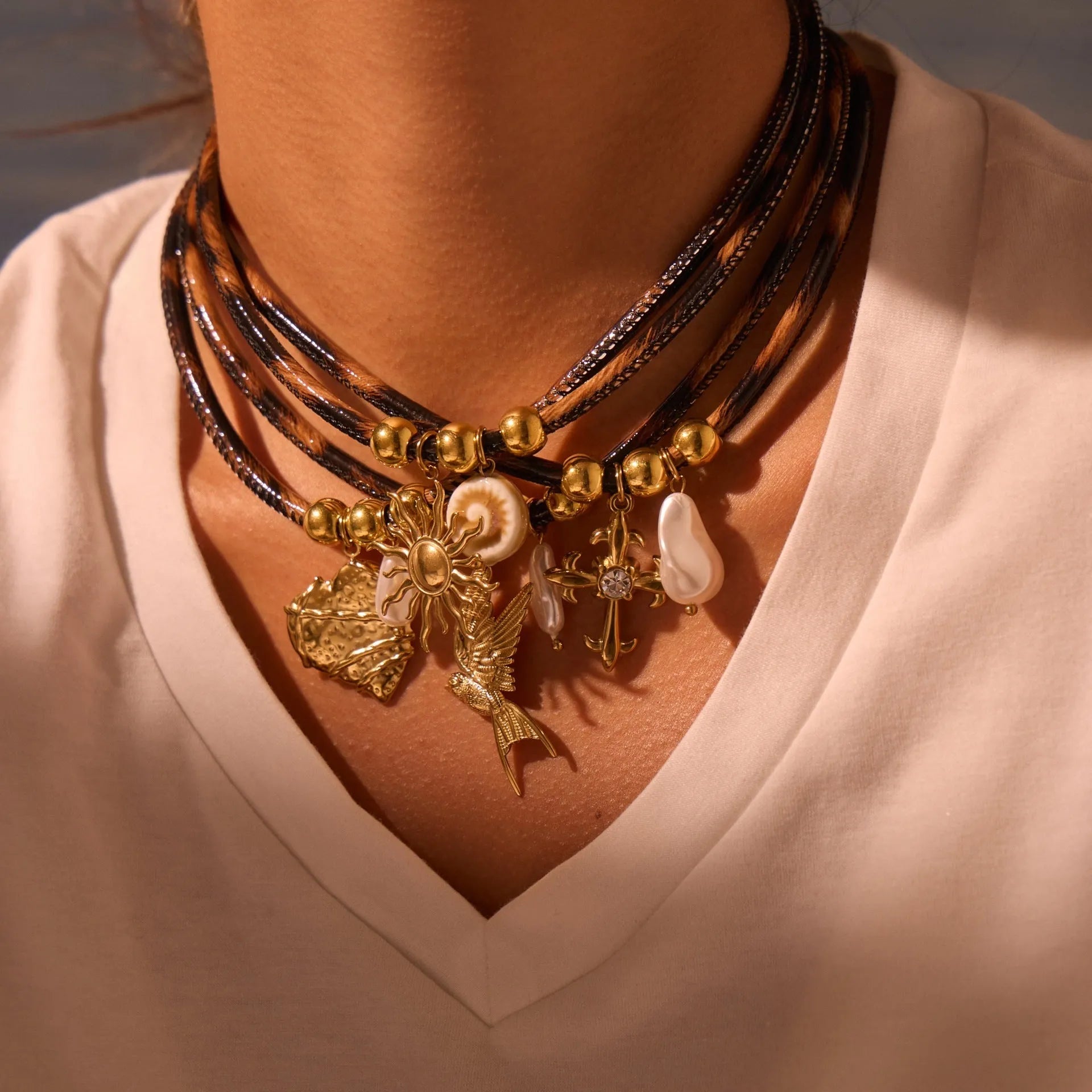 Geometric leopard pendant necklace for women on a stainless steel chain with adjustable length.