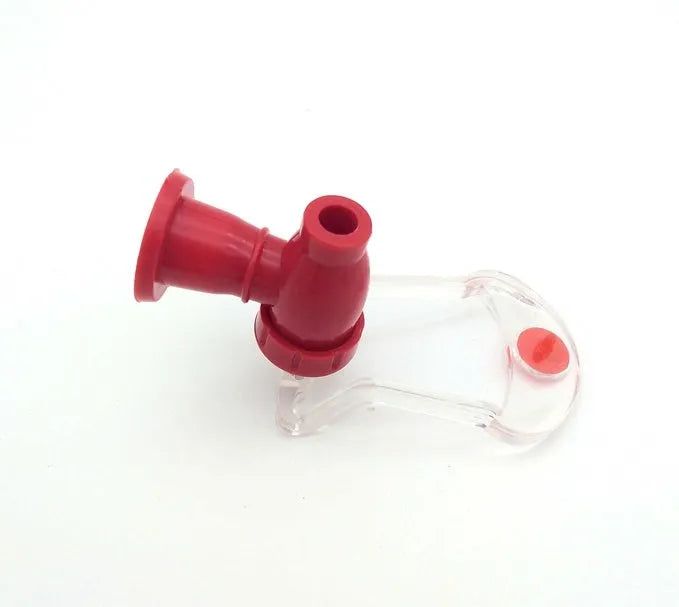 Red Magic Tap soda dispenser attached to inverted 2-litre bottle for push-button drink serving