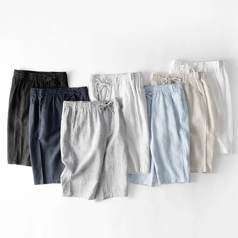 Men's loose-fit linen capri pants in a straight-leg style on a neutral background.