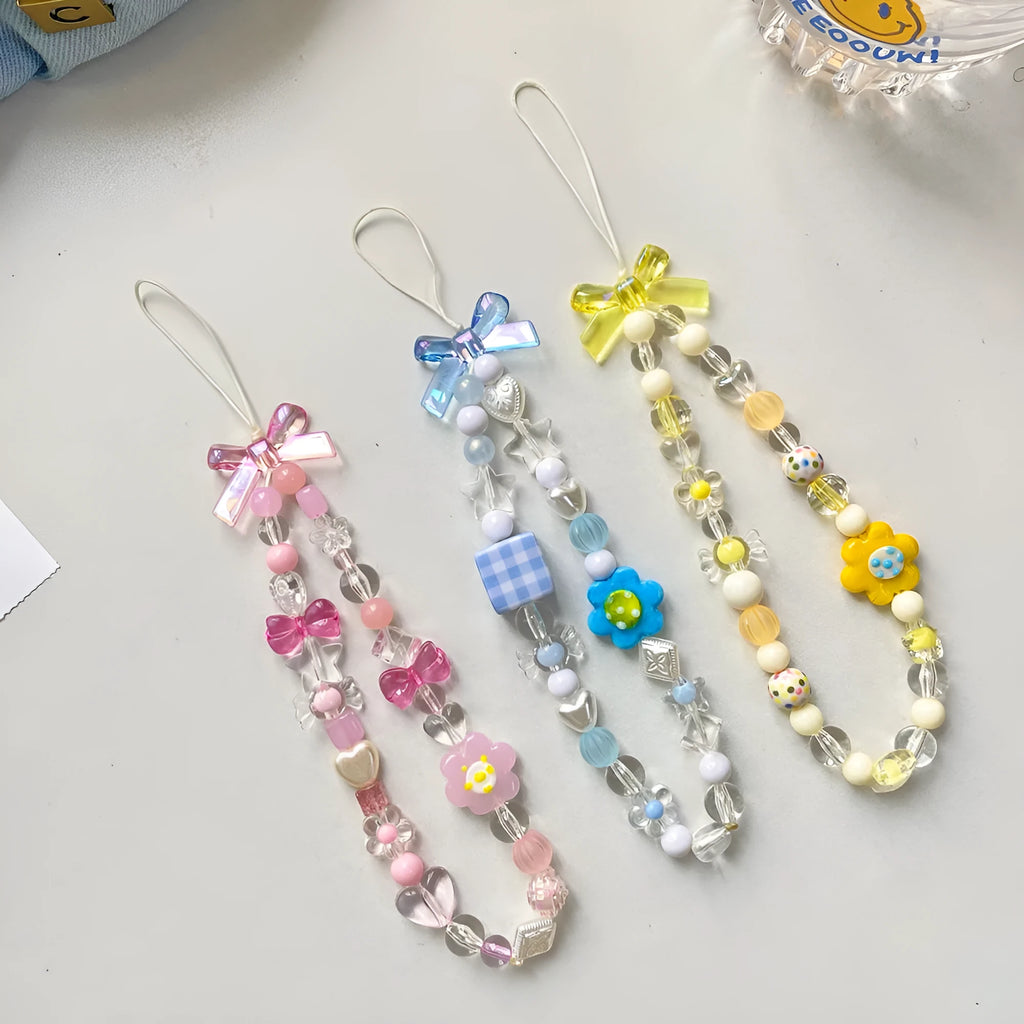 Beaded flower mobile phone lanyard with hand rope design in yellow, blue, or pink colour options