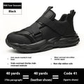 Black safety work shoes with steel toe cap and felt buckle closure on a white background