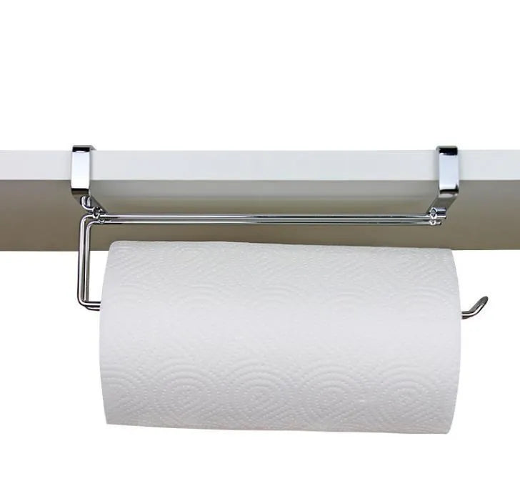 Silver stainless steel kitchen towel rack hanging on a cabinet door.