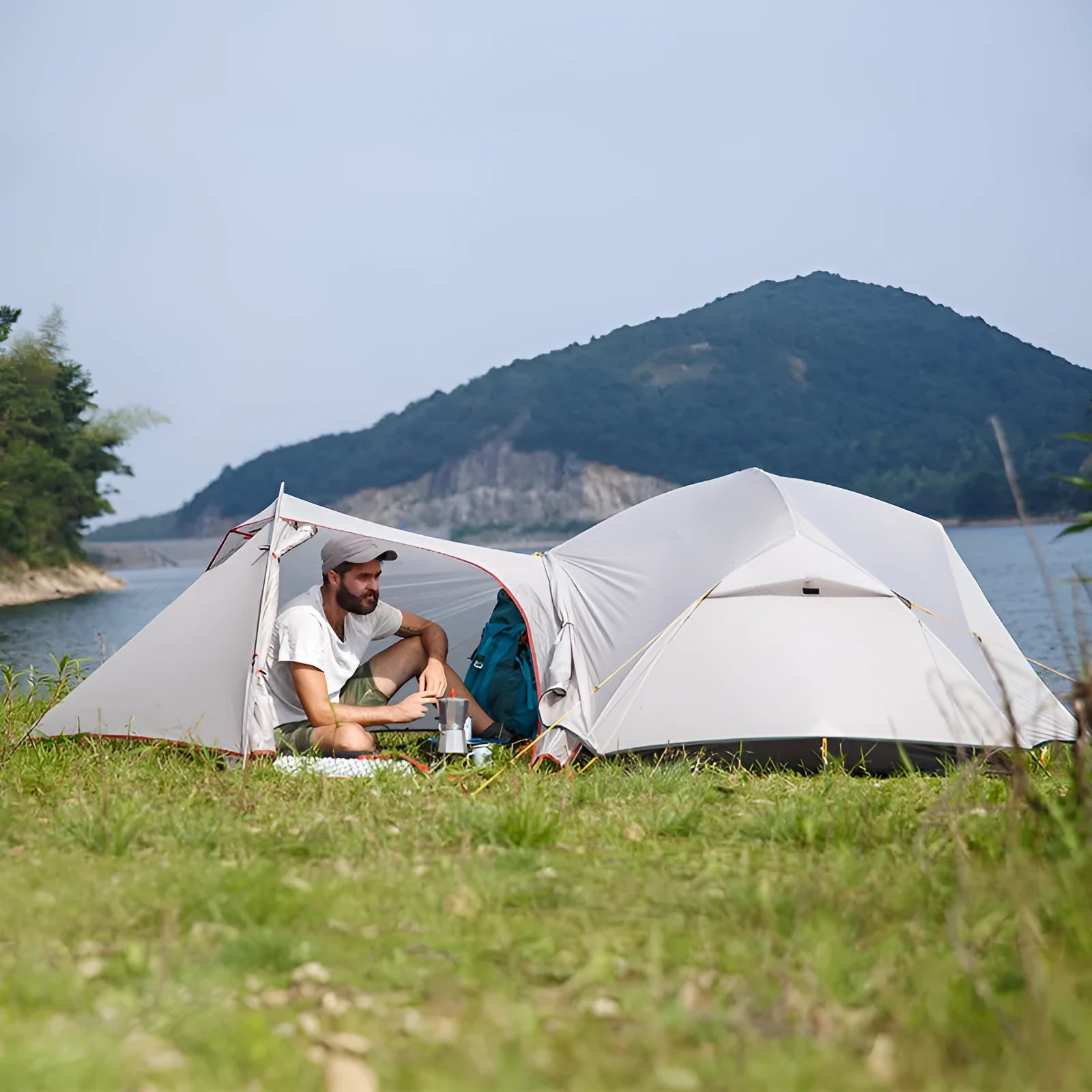 Ultralight 20D silicone nylon double layer camping tent for two people with aluminium poles in grey outdoor setting