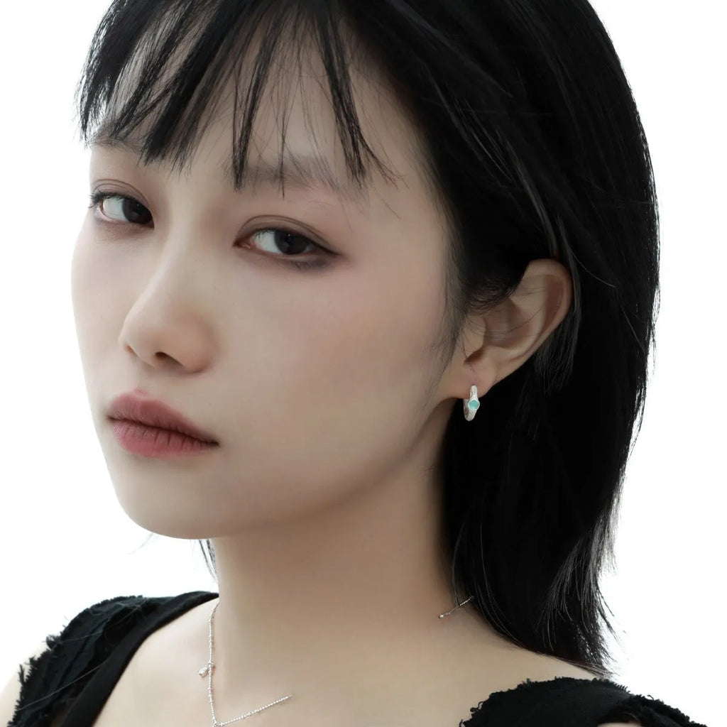 Burnt silver women's ear clip with geometry design and round elements in 925 sterling silver