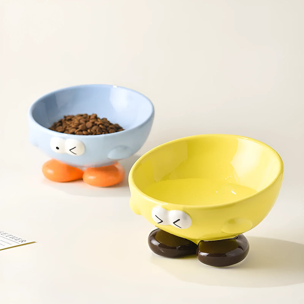 Blue oblique tall ceramic bowl for cat or dog food, designed for cervical spine support.