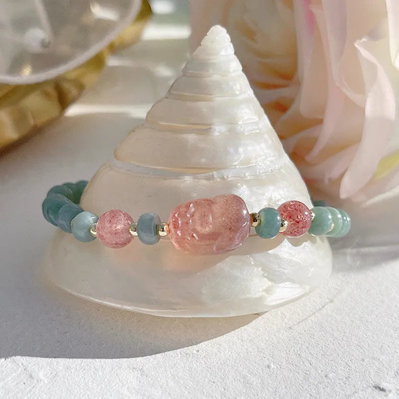 Natural blue water jade bracelet with gourd beads and peace buckle charm on woman's wrist