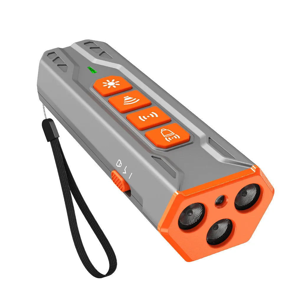 Three head ultrasonic dog trainer with LED light in grey and orange colour.