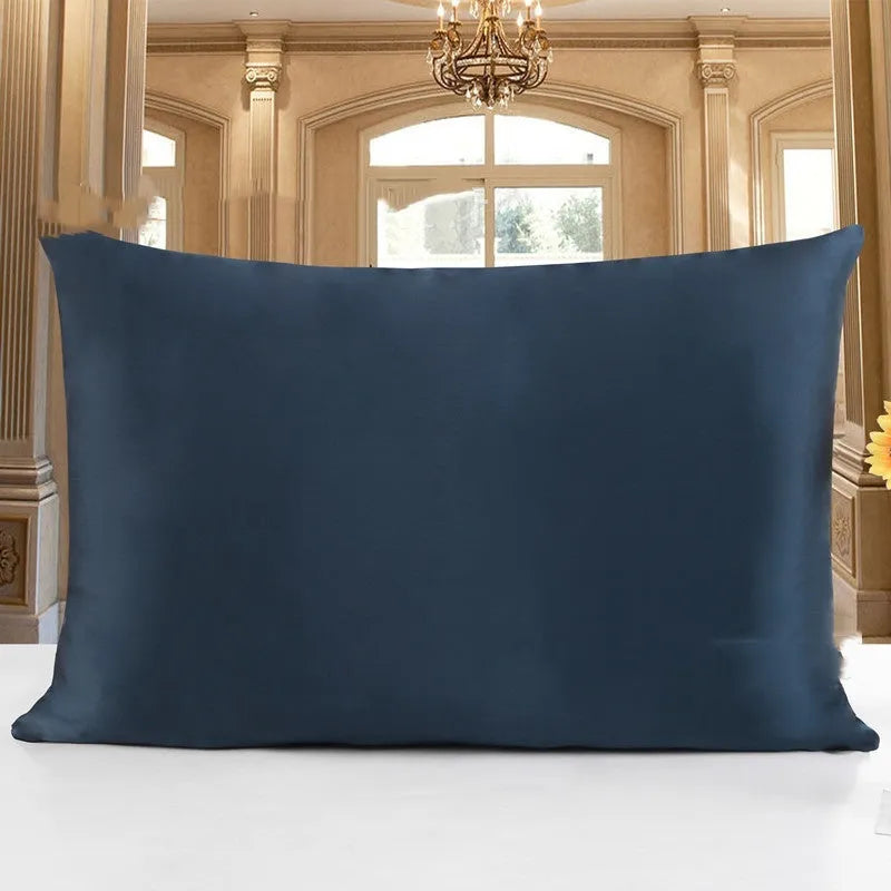 19 M double-sided silk pillowcase shown in one of 14 available colours, including apricot, sky blue, and black.