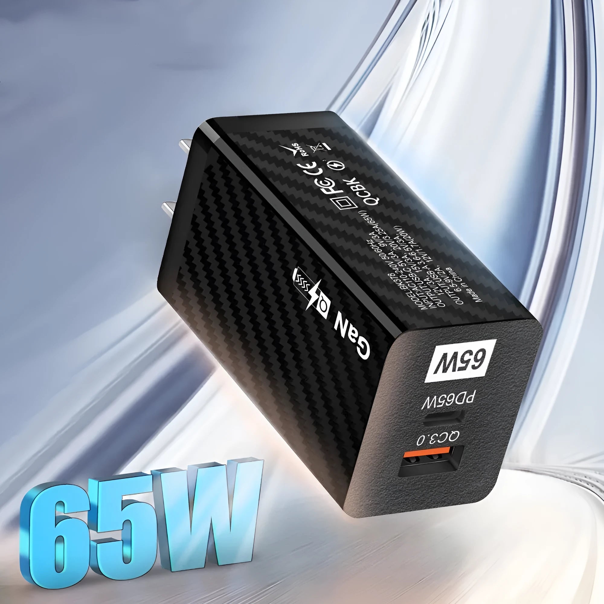 White Gallium Nitride 65W USB-C laptop charger with compact design measuring 38mm wide