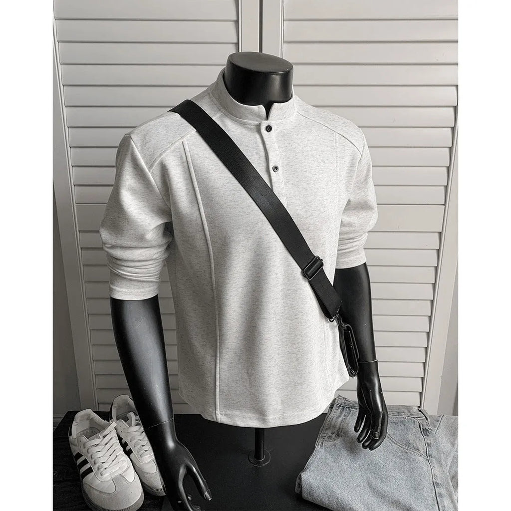 Men's loose fit polo shirt with patchwork stand-up collar and asymmetrical design in grey and black colours