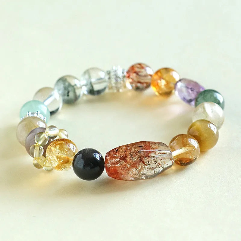 Natural crystal beaded bracelet with Duobao crystal beads in black gold Super Seven and natural colour variations