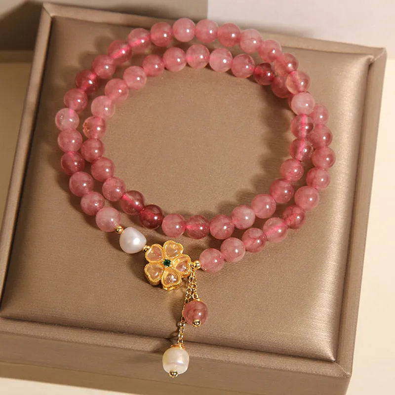 Women's double ring bracelet with strawberry quartz four-leaf clover design in Japanese Korean jewellery style