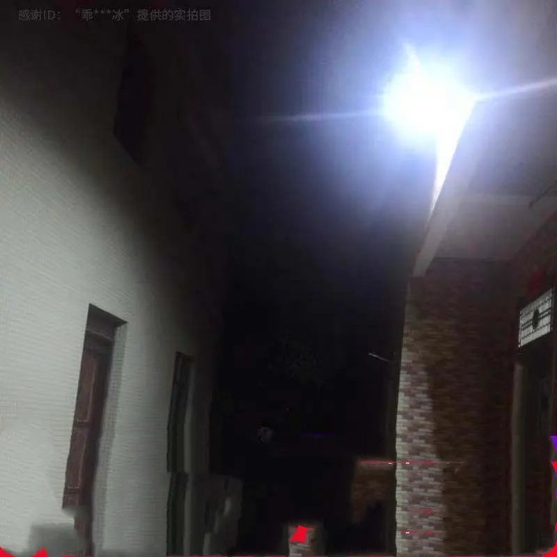 Black solar-powered LED flood light for outdoor garden and security lighting.