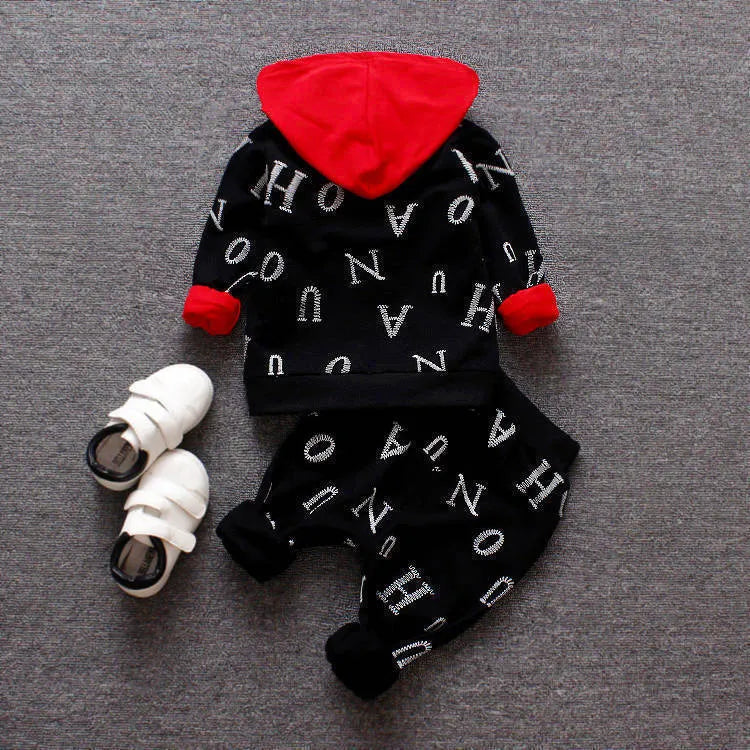 Children's long sleeve clothing set in red or white colours made from polyester and vinylon blend fabric