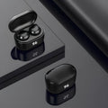 Black wireless stereo Bluetooth over-ear headset with earplug design on a white background.