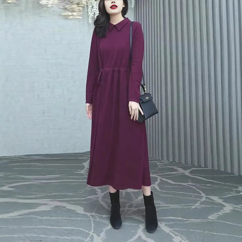 A purplish red plus size long dress with long sleeves for women in autumn and winter.