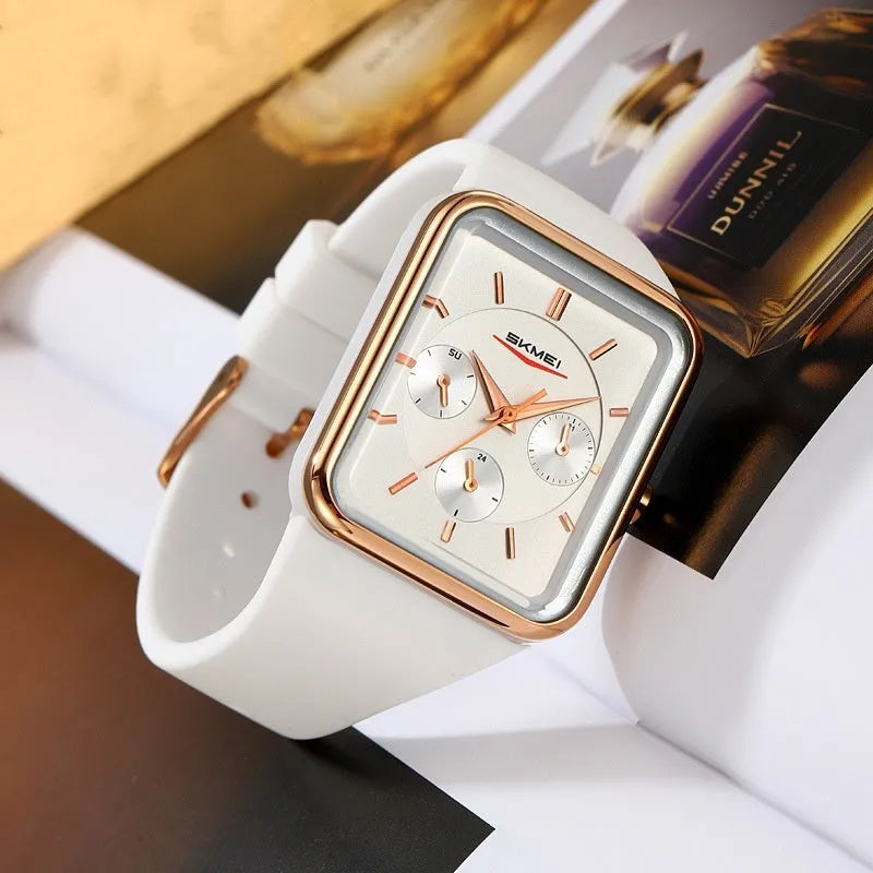 Square silicone waterproof digital watch for girls in multiple colour options on a wrist.
