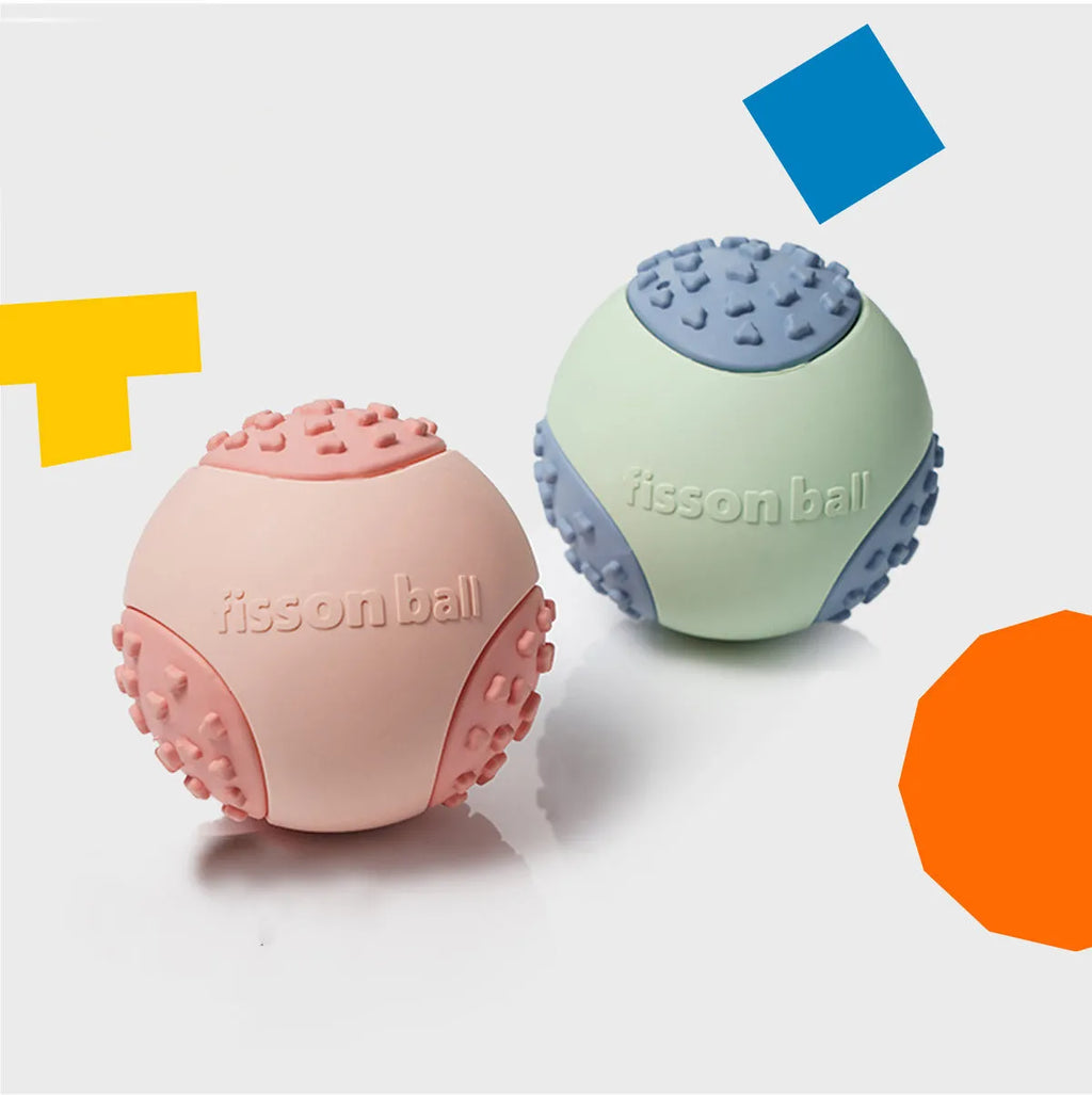 Green and pink rolling ball dog toys showing 64mm diameter size for interactive pet play