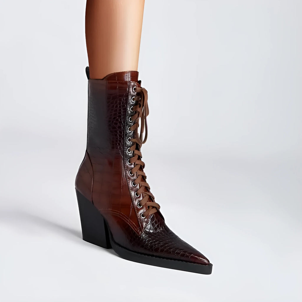 Women's dark brown pointed toe boots with a chunky heel, retro stone pattern, and side zipper.