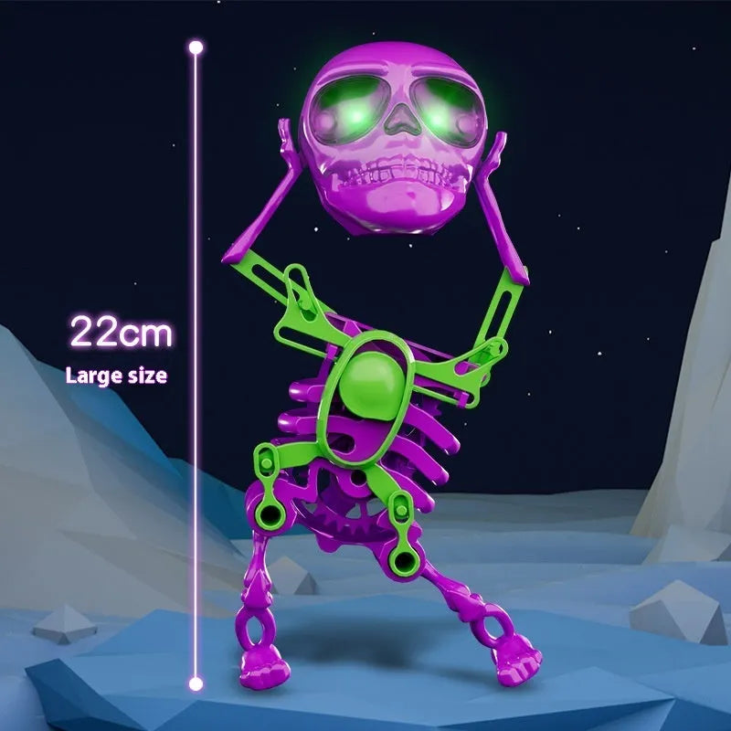 3D printed dancing skeleton gravity toy in pink and white, 22cm tall, on a desk
