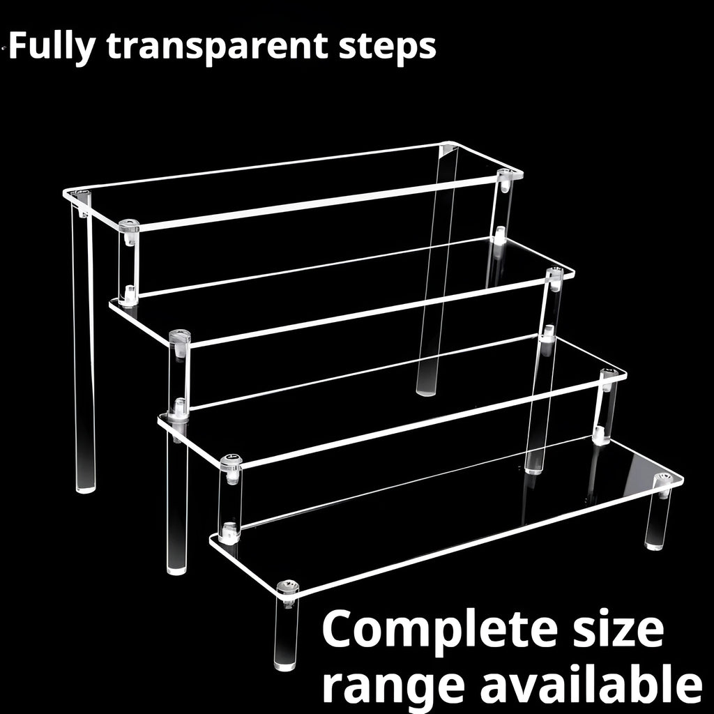 Transparent acrylic ladder display rack with three trapezoidal tiers showing blind box figurines on a desk