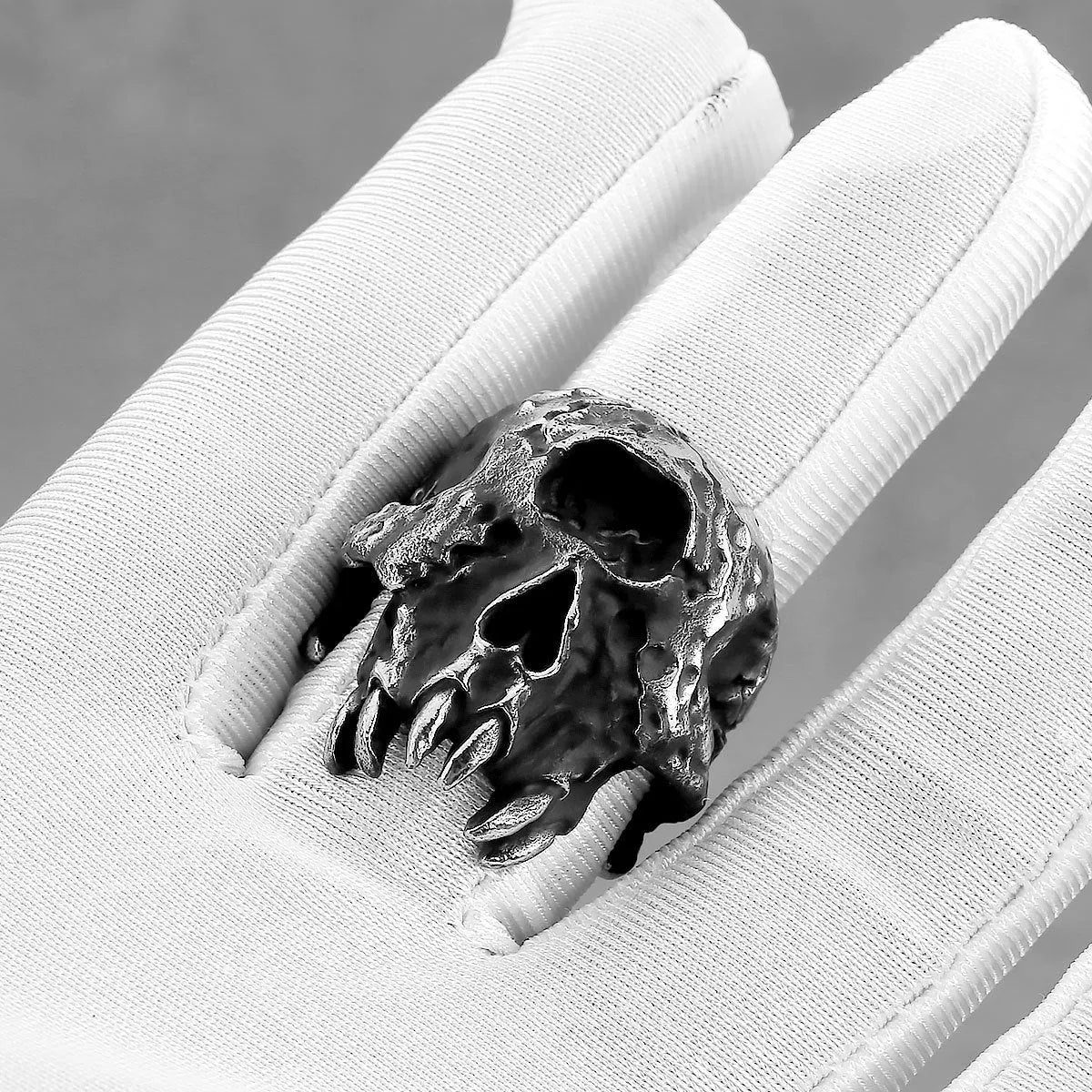Retro punk alloy ring with a detailed one-eyed skull design and electroplated finish.
