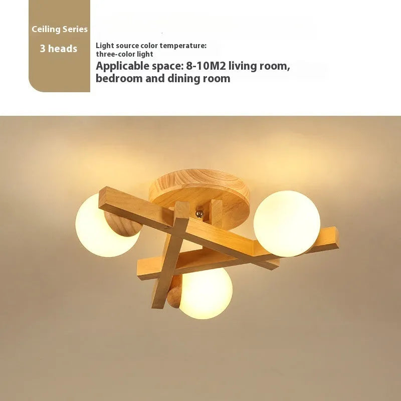Modern wooden-style Nordic ceiling light fixture with three adjustable heads.