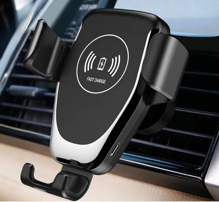 Black car wireless charger mounted on dashboard with iPhone secured in automatic clamp