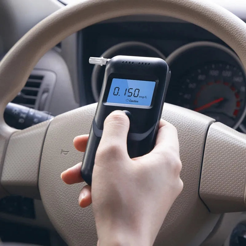 Black household alcohol breath tester for drinking checks and drunk driving detection